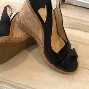 Jimmy Choo black wedge shoes with sling back worn once